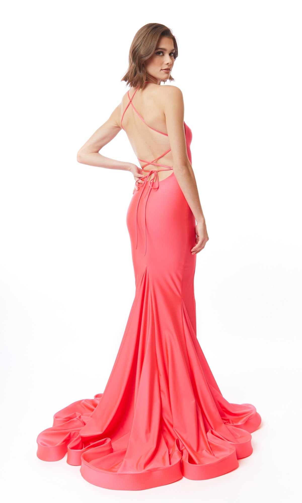 A woman faces away in the Atria 6550H Open-Back High-Neck Long Prom Dress, flaunting its elegant train and chic crisscross straps against a plain white background.